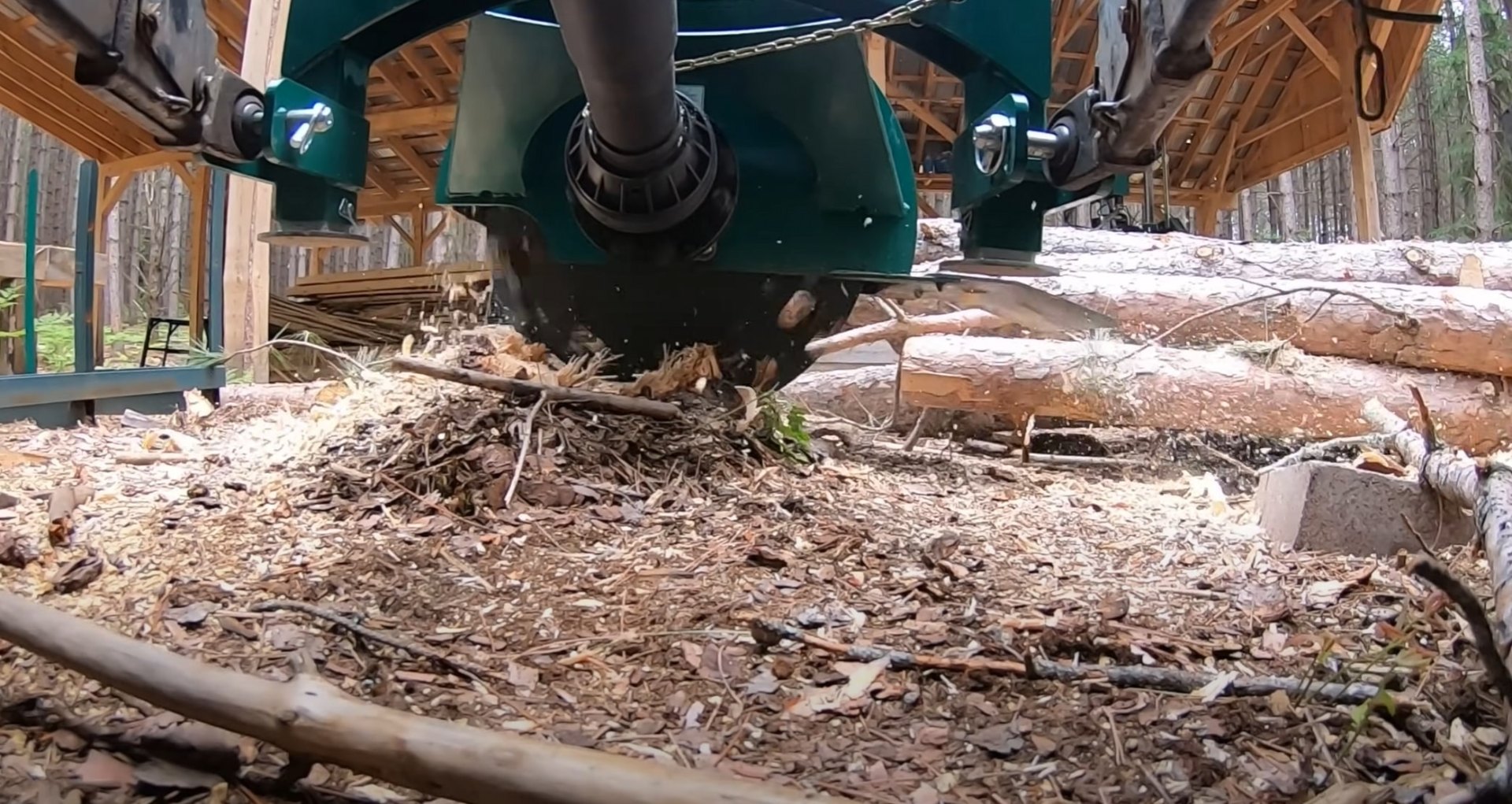 Stump Grinding Equipment - Portsmouth Tree Services Professional stump grinding equipment in action creating wood chips